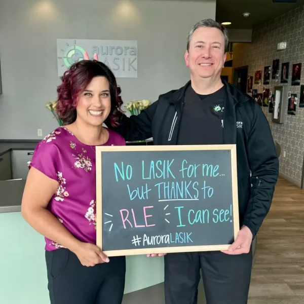 Real RLE patient posing with Dr. Munson after surgery